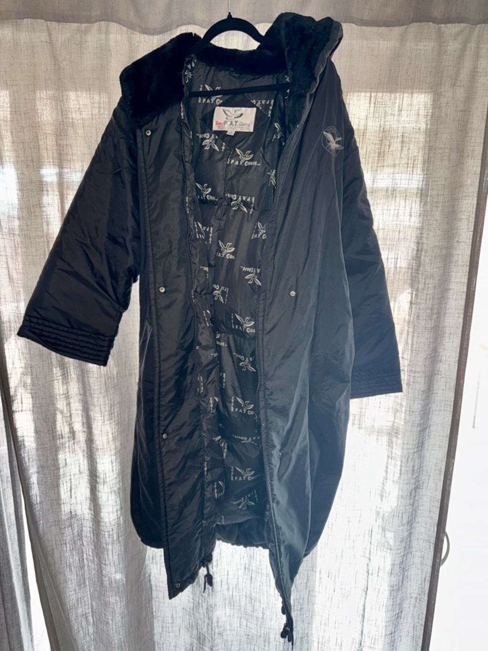Triple fat, goose Long Black Quilted Puffer Coat with Faux-Fur Trim Hood